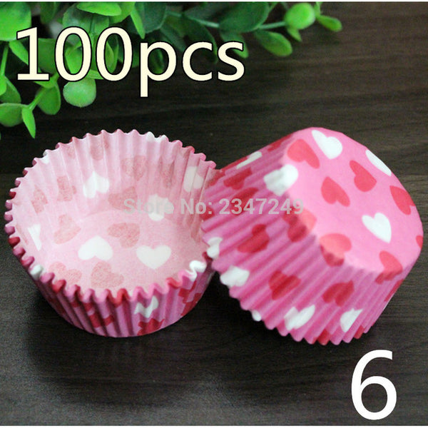 Caissettes à cupcake couleur rose avec petits coeurs